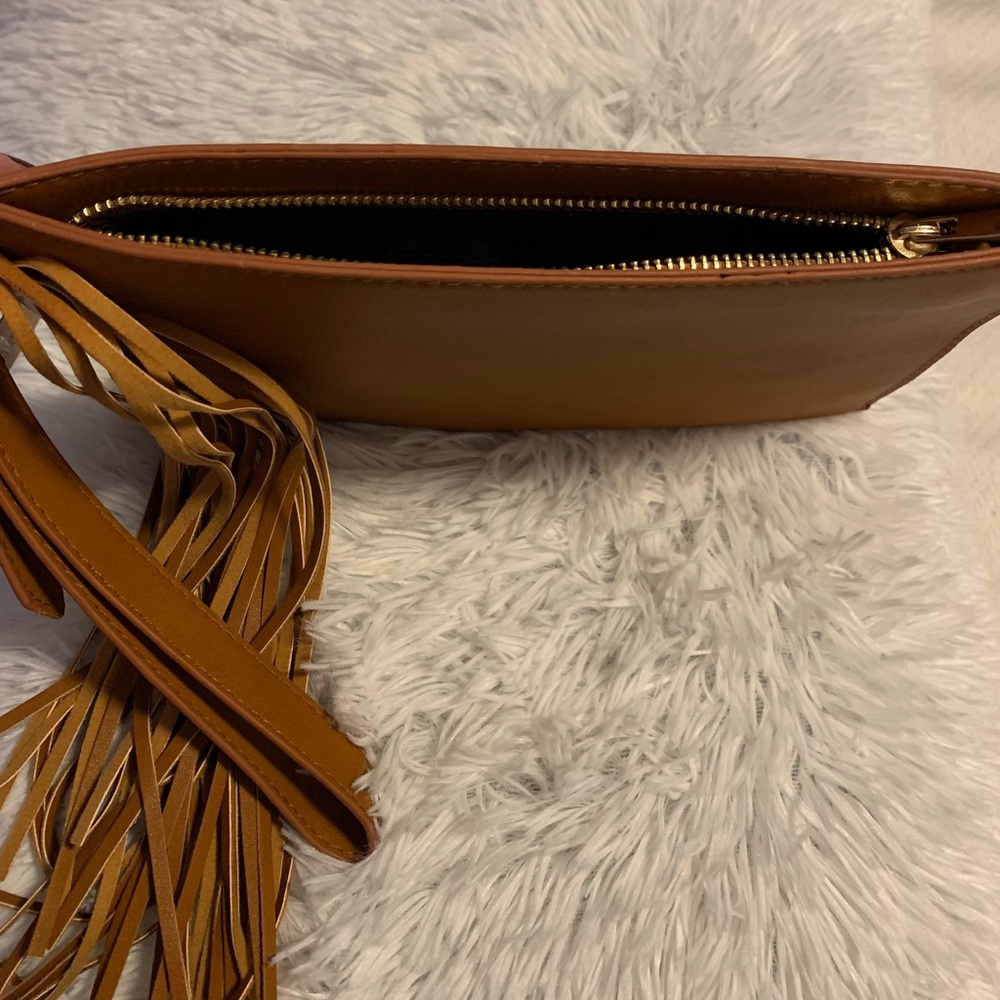 Clutch/wristlet bag with fringe and strap